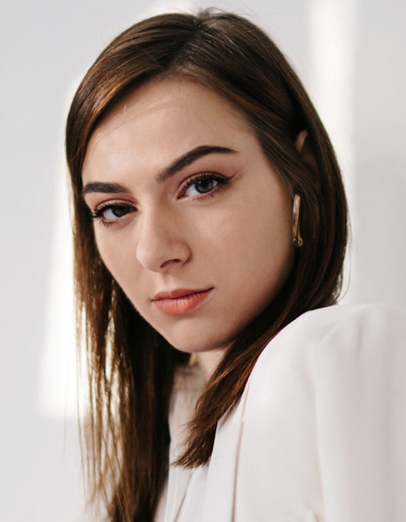 model with thinner, more defined and styled brows
